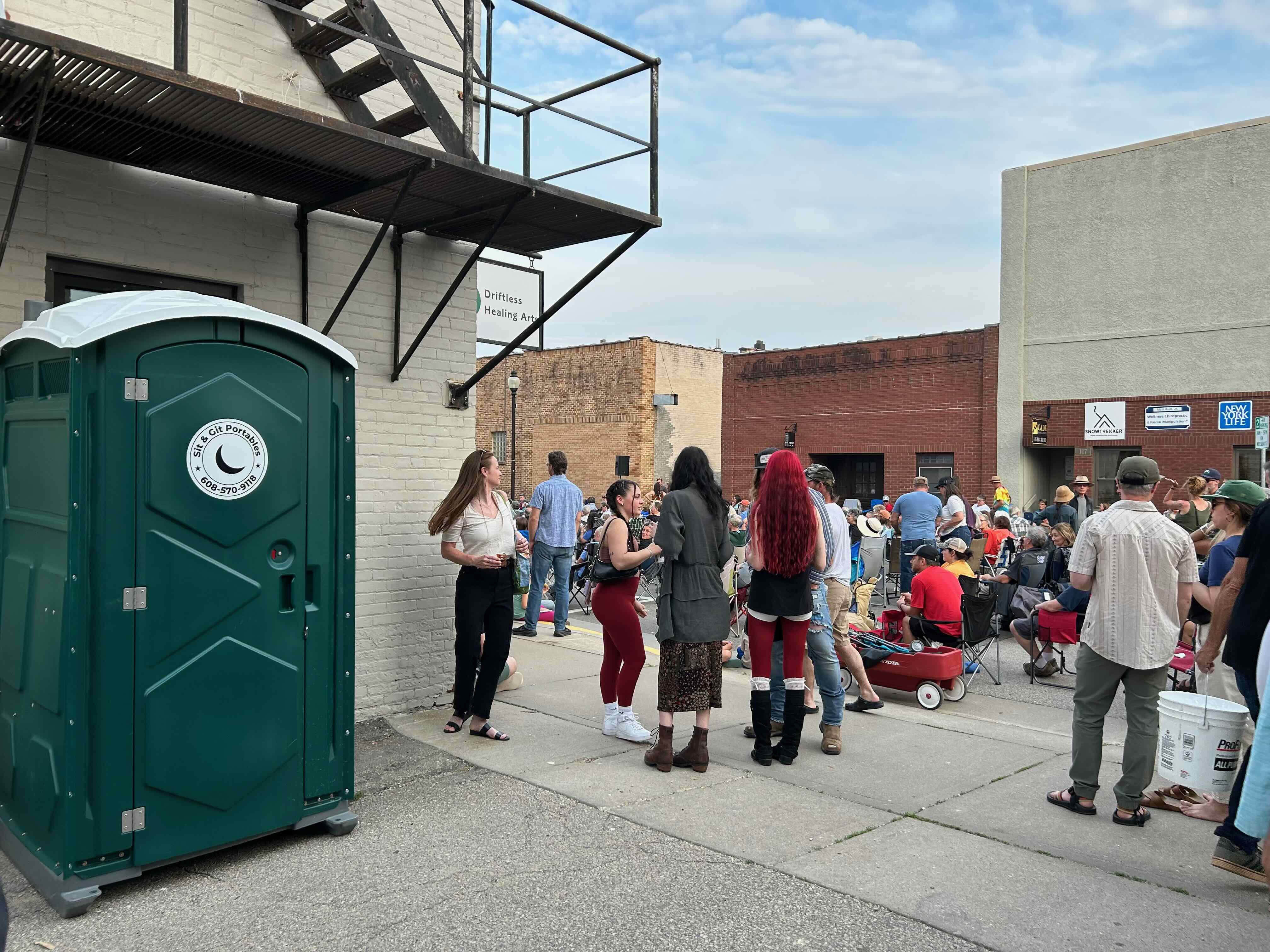 Portable restrooms at a Live in Viroqua concert
